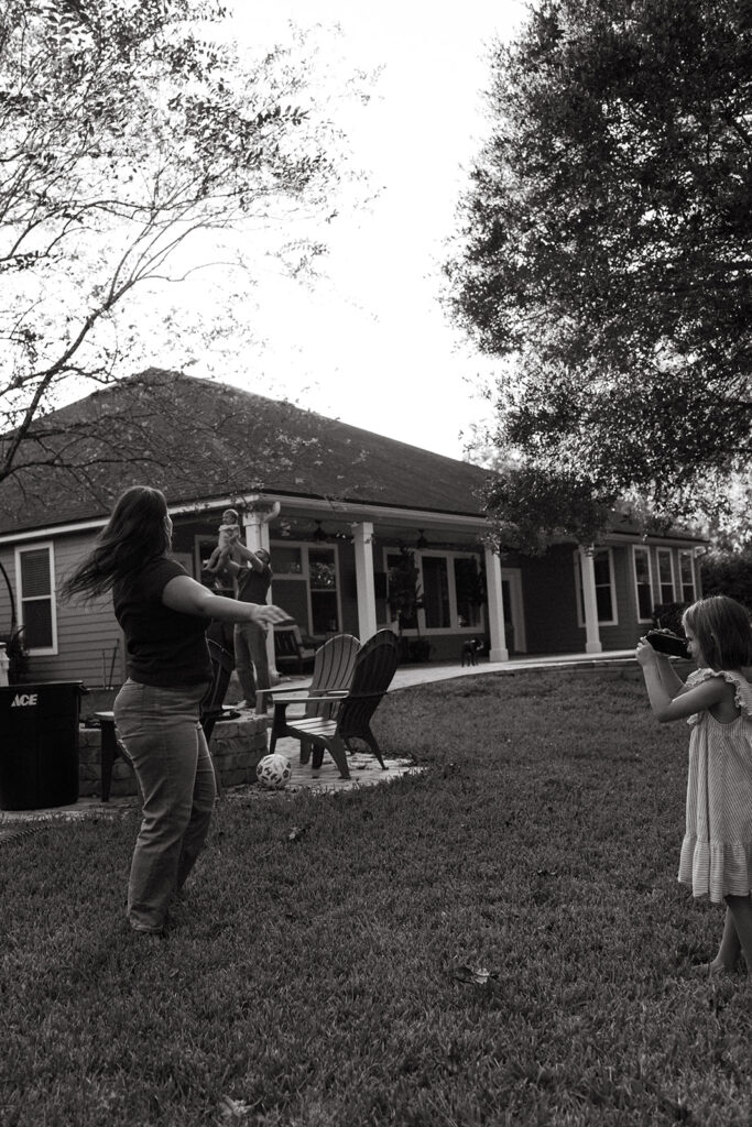 mom and daughter spending time in the backyard.