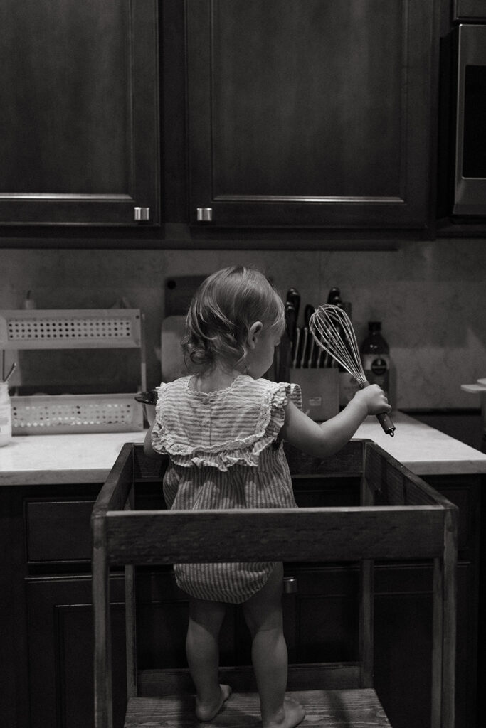 daughter helping bake muffins.