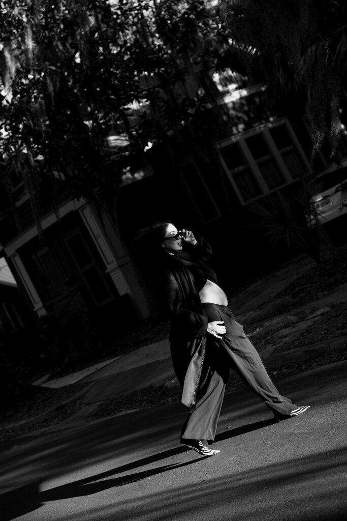 maternity photography in jacksonville fl capturing a pregnant mom walking down the street